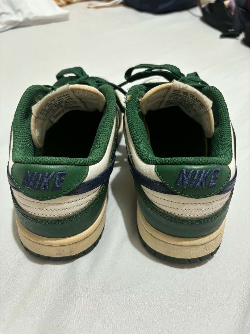 RUSH/DM FOR LP | Nike Dunk Low Retro Green Navy (Category: Sneakers) located in Manila. Submitted by segundamanoshop (Listing ID 1467125302, Image 3). Description: FITS SIZE 6 (i'm a size 6, i include allowance for socks) - Colorway: Green and white leather upper with navy blue swoosh accents - Details: Green laces, matching inner lining, and cream-tinted vintage midsole - Branding: Nike logo on the tongue tag and heel tab - Condition: Normal wea
