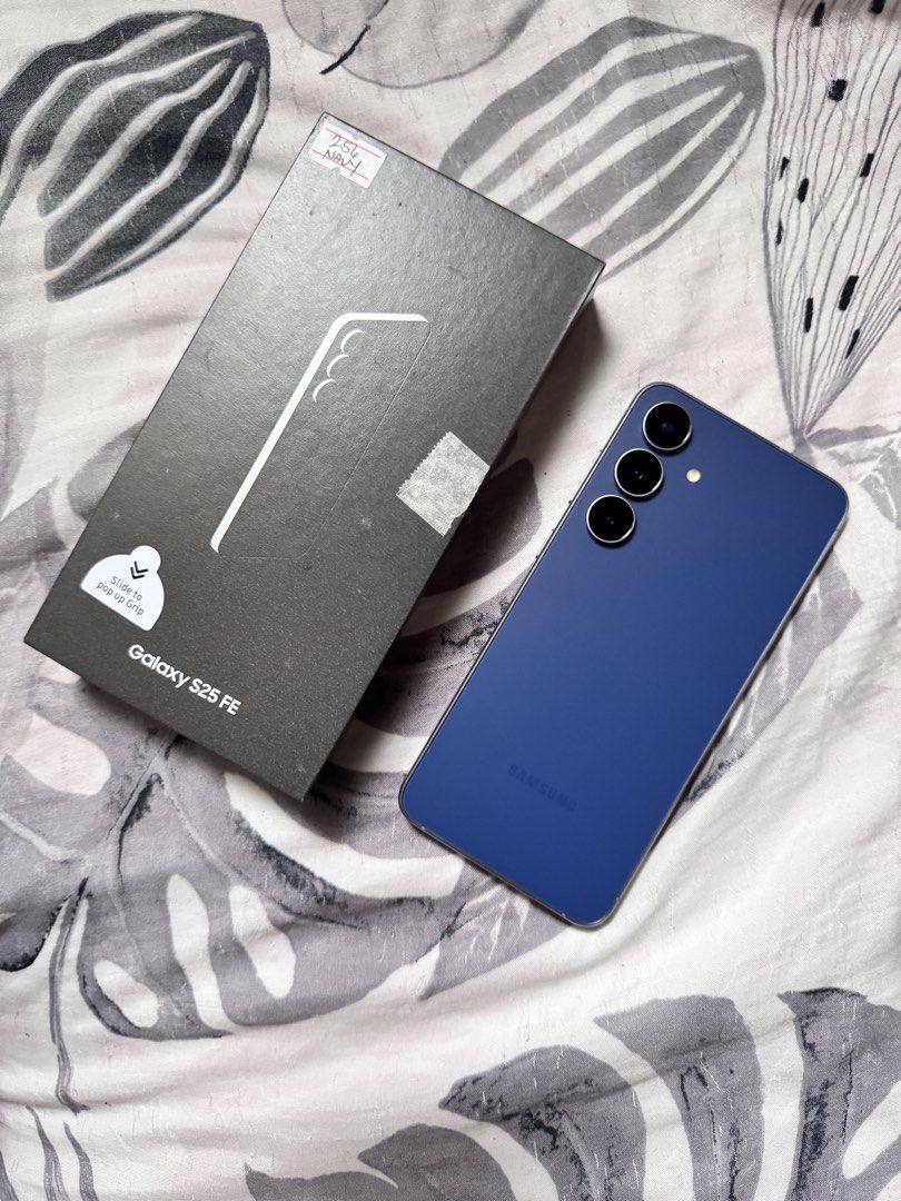 Samsung S25 FE 256GB Navy (Category: Samsung) located in Umingan. Submitted by kennedysonaco171 (Listing ID 1467167458, Image 1). Description: Comes with box, charger, cases, and screen protector. RFS: upgrade.