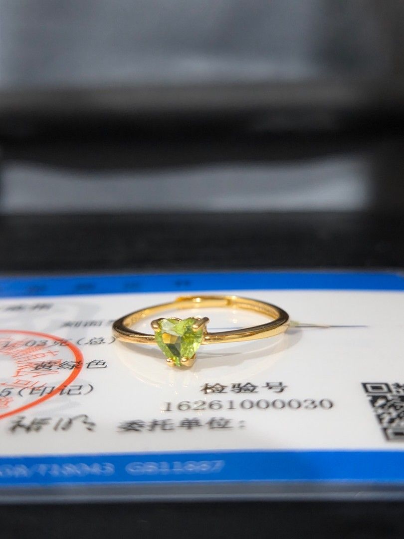 S925 Gold Plated Setting Peridot Ring (Category: Rings) located in Manila. Submitted by fayiefar (Listing ID 1467097930, Image 1). Description: - Material: Gold-plated S925 sterling silver - Gemstone: Vibrant green heart-cut peridot - Fit: Adjustable band fits most finger sizes - Style: Simple and dainty - Includes: Authentication certificate card.