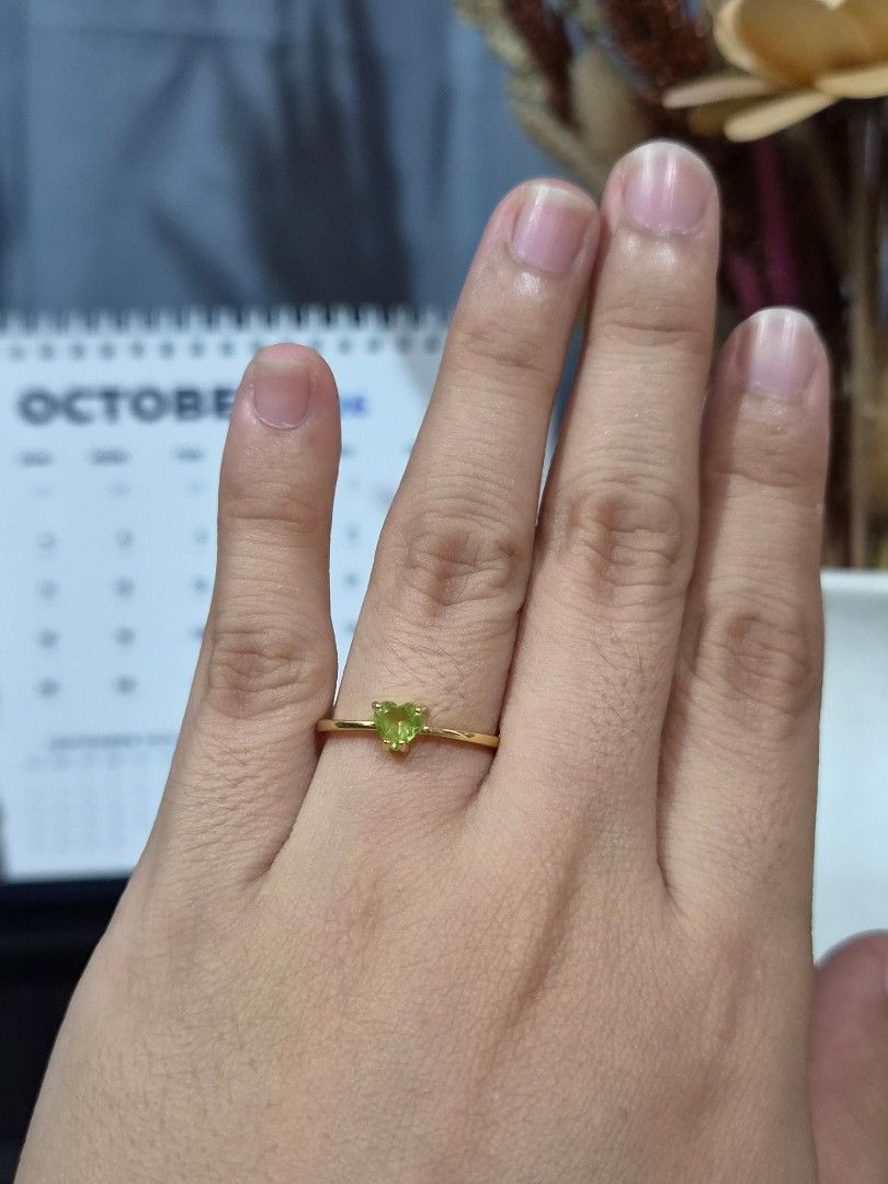 S925 Gold Plated Setting Peridot Ring (Category: Rings) located in Manila. Submitted by fayiefar (Listing ID 1467097930, Image 3). Description: - Material: Gold-plated S925 sterling silver - Gemstone: Vibrant green heart-cut peridot - Fit: Adjustable band fits most finger sizes - Style: Simple and dainty - Includes: Authentication certificate card.