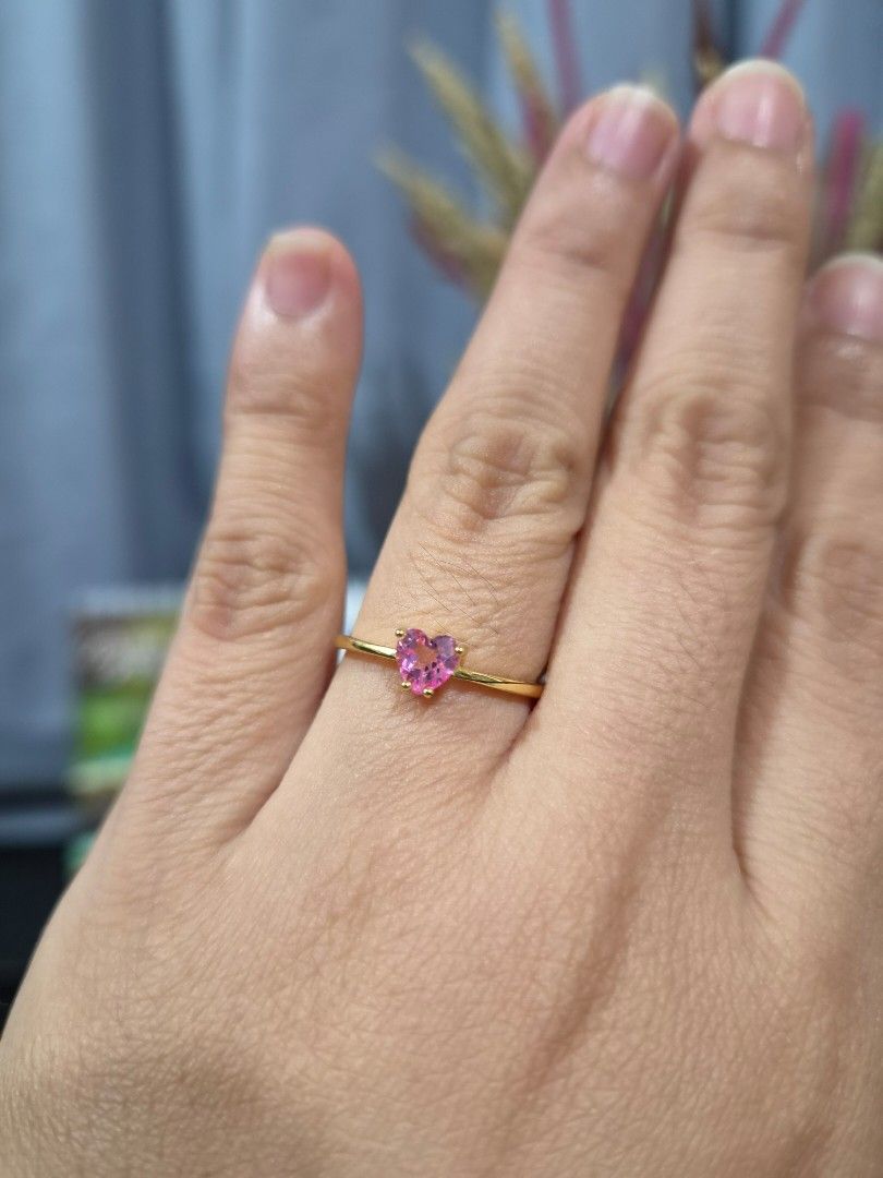 S925 Gold Setting Pink Topaz Stone Ring (Category: Rings) located in Manila. Submitted by fayiefar (Listing ID 1467104562, Image 2). Description: - S925 Gold-Plated Pink Topaz Ring - with S925 stamp - Material: Gold setting S925 silver with a brilliant pink topaz heart-cut center stone - Fit: Adjustable open band suitable for most finger sizes - Comfort: simple and dainty - Inclusions: Comes with an official authentication certificate card.