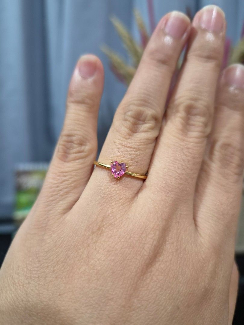 S925 Gold Setting Pink Topaz Stone Ring (Category: Rings) located in Manila. Submitted by fayiefar (Listing ID 1467104562, Image 3). Description: - S925 Gold-Plated Pink Topaz Ring - with S925 stamp - Material: Gold setting S925 silver with a brilliant pink topaz heart-cut center stone - Fit: Adjustable open band suitable for most finger sizes - Comfort: simple and dainty - Inclusions: Comes with an official authentication certificate card.
