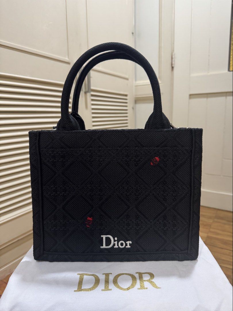 [RUSH SALE] Dior Book Tote with Strap - Small (Category: Tote Bags) located in Cebu City. Submitted by toteladyph (Listing ID 1466993877, Image 1). Description: **Good Quality - coded** Classic and elegant Dior Small Book Tote in black embroidered canvas, featuring the iconic Dior lettering on the front and signature quilted-style motif. Comes with top handles, a detachable shoulder strap, and silver-tone hardware. Details: * Brand: Christian Dio