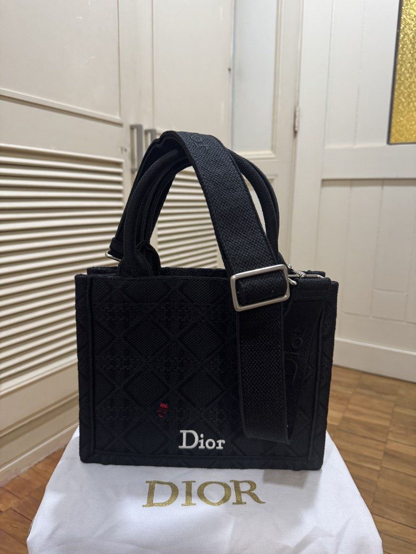 [RUSH SALE] Dior Book Tote with Strap - Small (Category: Tote Bags) located in Cebu City. Submitted by toteladyph (Listing ID 1466993877, Image 2). Description: **Good Quality - coded** Classic and elegant Dior Small Book Tote in black embroidered canvas, featuring the iconic Dior lettering on the front and signature quilted-style motif. Comes with top handles, a detachable shoulder strap, and silver-tone hardware. Details: * Brand: Christian Dio