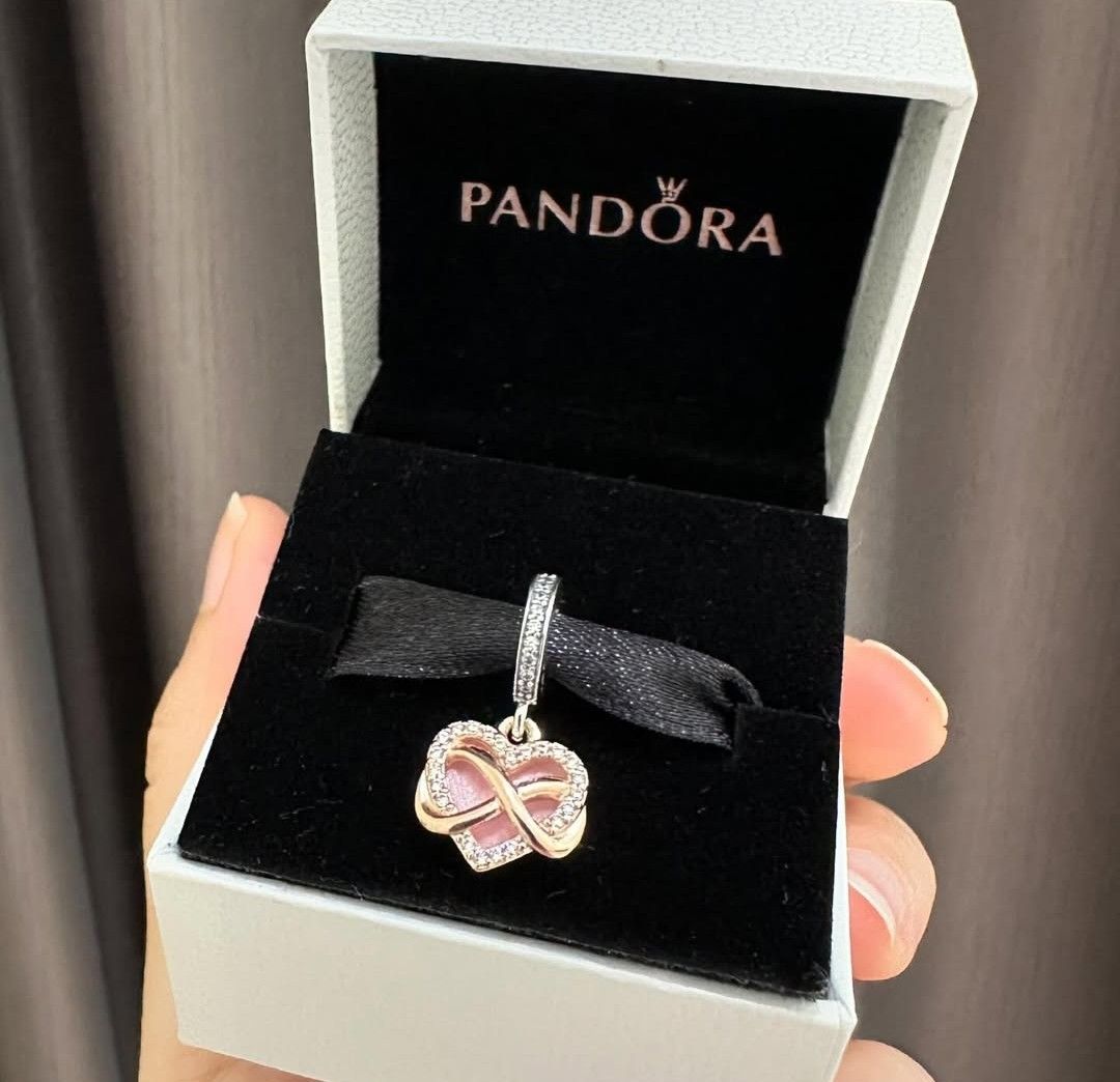 SALE❗Pandora Sparkling Infinity Heart Dangle Charm (Category: Charms) located in Manila. Submitted by badaloves_u (Listing ID 1467002377, Image 1). Description: - 💯 Authentic Pandora with Authenticity ALE marks - FREE Box and Paper bag 🛍️ - ✨ FREE Cleaning to any Pandora Store 🛵 LALAMOVE courier for same day delivery 🚚 J&T provincial courier.