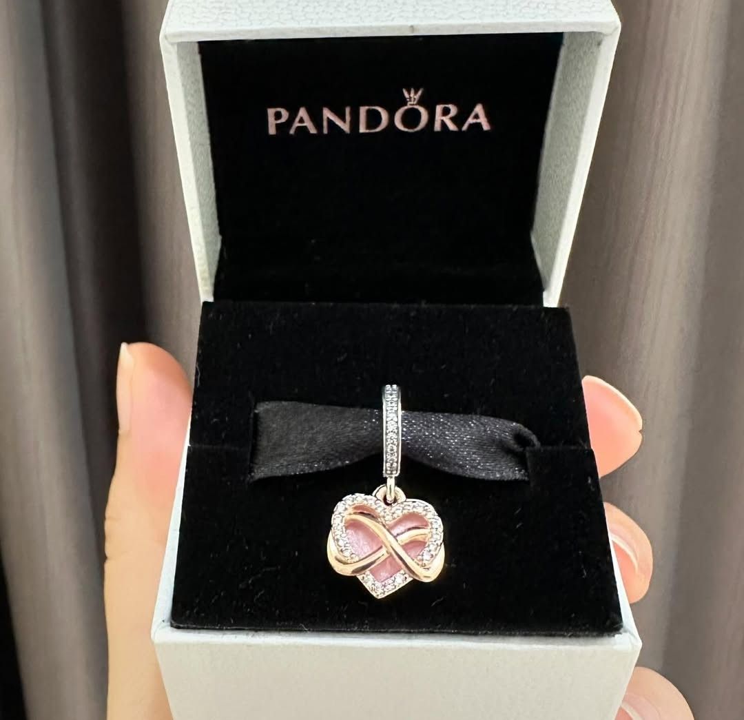 SALE❗Pandora Sparkling Infinity Heart Dangle Charm (Category: Charms) located in Manila. Submitted by badaloves_u (Listing ID 1467002377, Image 2). Description: - 💯 Authentic Pandora with Authenticity ALE marks - FREE Box and Paper bag 🛍️ - ✨ FREE Cleaning to any Pandora Store 🛵 LALAMOVE courier for same day delivery 🚚 J&T provincial courier.