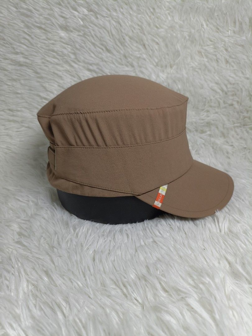 Salomon Brown Cadet Cap Army Hat (Category: Hats & Beanies) located in Imus. Submitted by grindhouse.thriftshop (Listing ID 1467061142, Image 2). Description: - Brand: Salomon - Style: Brown cadet hat with a flat top and curved brim - Details: Small color-blocked logo tag on the side, structured crown with stitching - Fit: Adjustable metal buckle strap at the back for a custom fit - Color: Neutral earth tone, perfect for casual outdoor outfits.