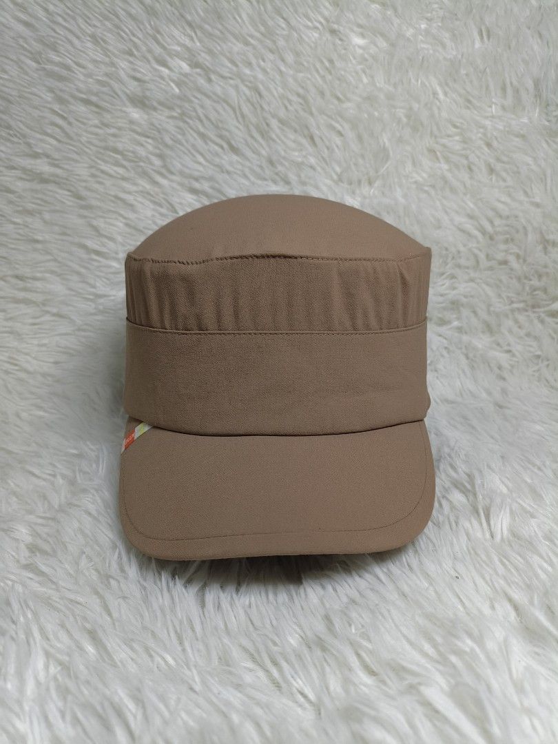 Salomon Brown Cadet Cap Army Hat (Category: Hats & Beanies) located in Imus. Submitted by grindhouse.thriftshop (Listing ID 1467061142, Image 1). Description: - Brand: Salomon - Style: Brown cadet hat with a flat top and curved brim - Details: Small color-blocked logo tag on the side, structured crown with stitching - Fit: Adjustable metal buckle strap at the back for a custom fit - Color: Neutral earth tone, perfect for casual outdoor outfits.