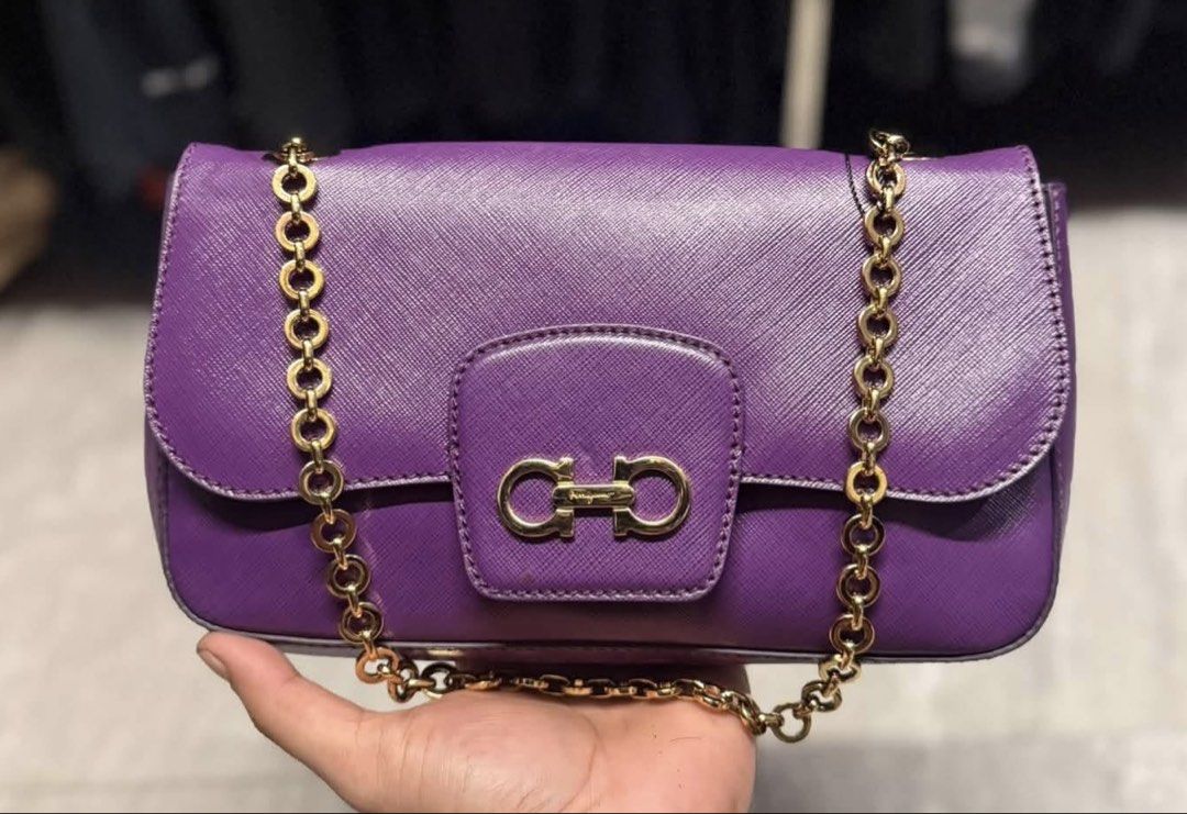Salvatorre Ferragammo (Category: Luxury Bags & Wallets) located in Legazpi City. Submitted by thesource052 (Listing ID 1467163692, Image 1). Description: Salvatore Ferragamo Purple Leather Gancini Flap Bag Shoulder Bag / Kili bag Almost new With authenticity card Grape Srp before : 8900 HKD. Around 72k php price before Price now for only 8k only FREESHIP VIA JNT OR LBC Free HERMES ORIG DUSTBAG. .