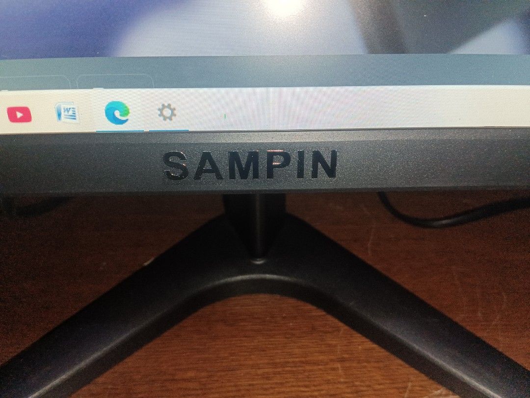 Sampin Computer Monitor (Category: Monitor Screens) located in Quezon City. Submitted by safecan.safecan (Listing ID 1467087262, Image 3). Description: - Brand/Model: Sampin Desktop Monitor - Color: Sleek black with a clean bezel and centered Sampin logo - Condition: Fully functional, screen powers on and displays clearly - Included: Stable V-shaped stand base as shown in pictures - Perfect for work, study, or daily setup use 22 inch. with box an