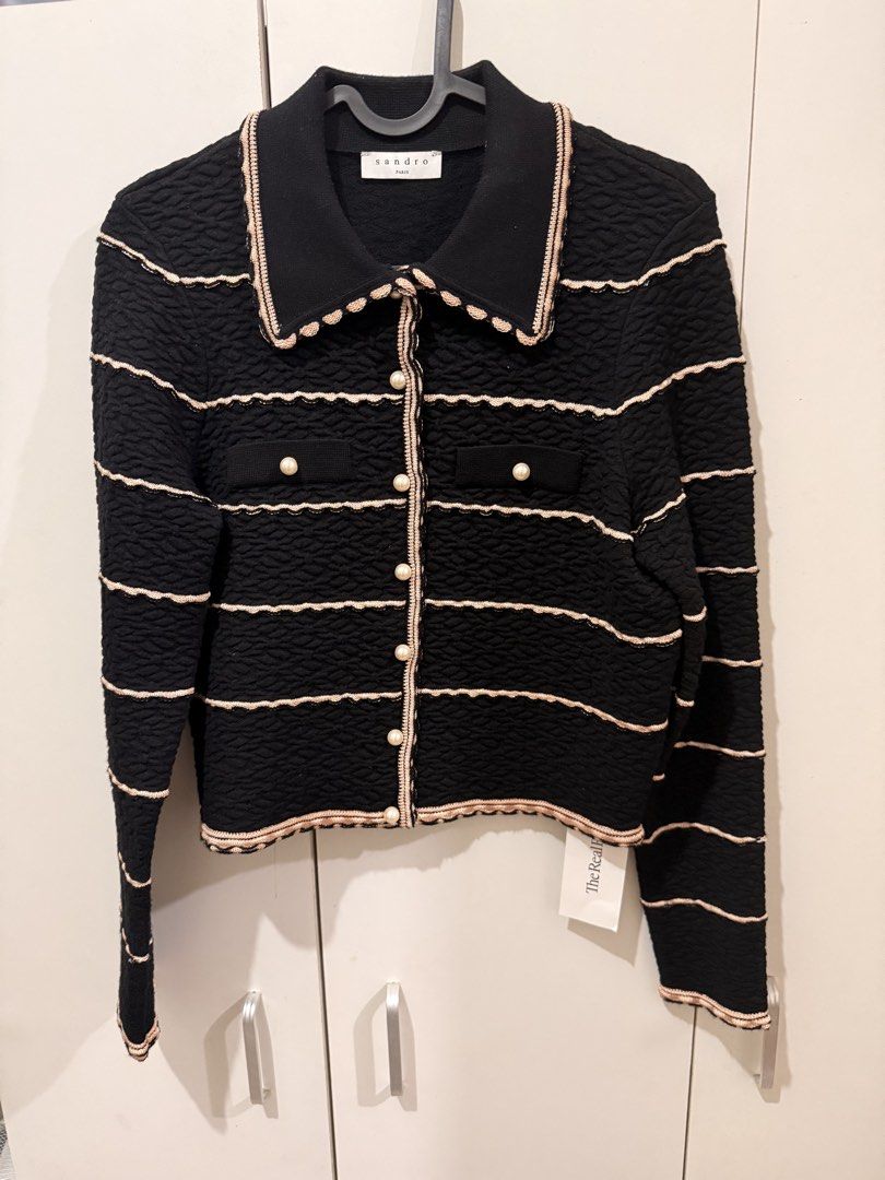 Sandro Stripe Embroidered Cropped Jacket/CARDIGAN- Black (Category: Coats, Jackets and Outerwear) located in Quezon City. Submitted by mine4now (Listing ID 1467126898, Image 1). Description: WHAT: Sandro Stripe Embroidered Cropped Jacket/cardigan - Black with pearl buttons ORIGIN : Bought from THE REALREAL online shop FOR about $170 in the US. SIZE: XS To S Condition: Unworn since purchased. Tag from the store still attached. RFS: DECLUTTERING Sh