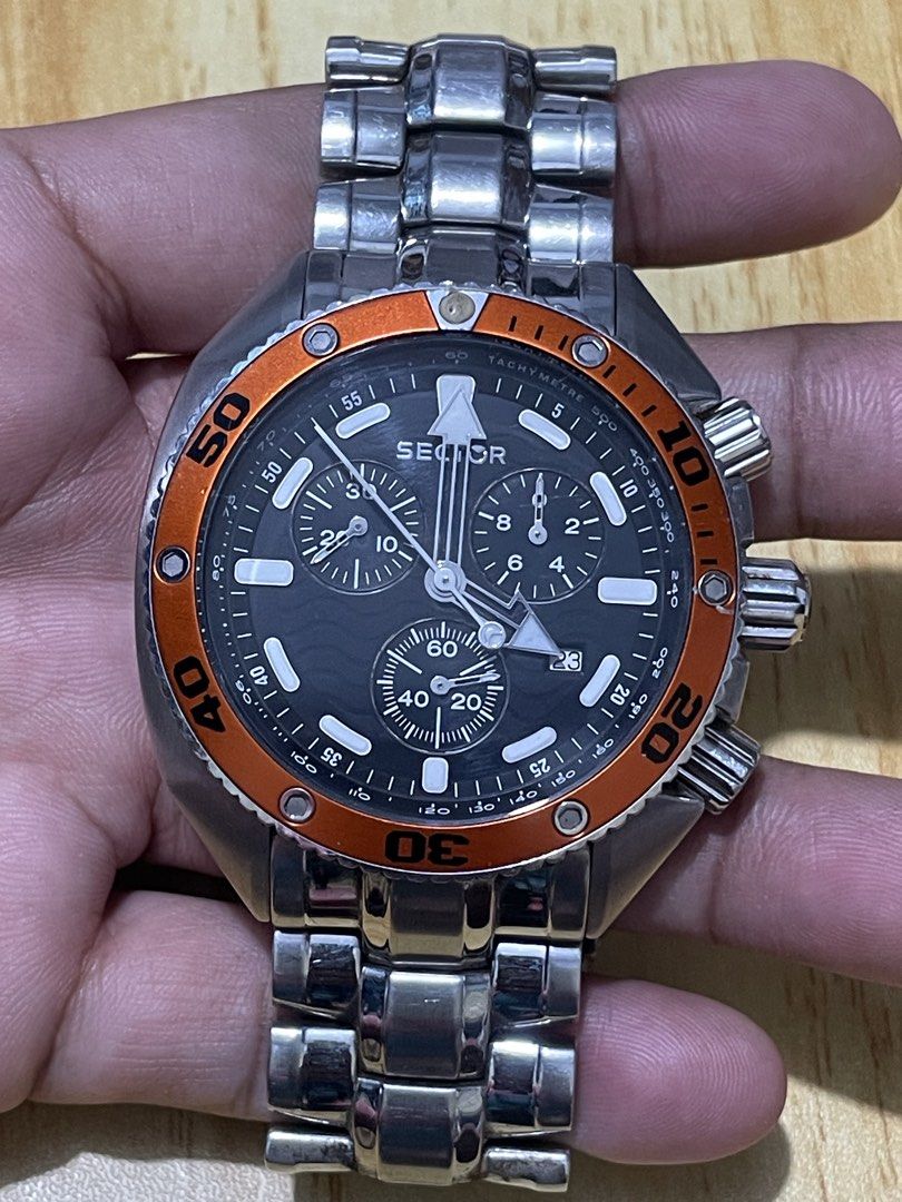 Sector Marine Ocean Master Chronograph (Category: Men's Watches) located in Taguig. Submitted by tester1x (Listing ID 1467050862, Image 2). Description: Sector Marine Ocean Master Chronograph Swiss Made Quartz 3253966025 - 51833 Stainless Steel Black Wave Dial Orange Bezel (Not Rotating) 44.5MM Sector Stainless Steel Bracelet 7inch wrist plus size.