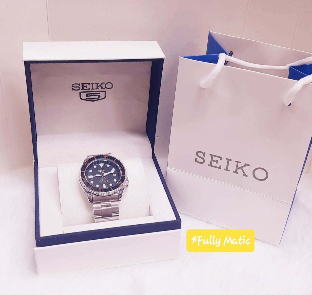Seiko 5 Automatic Watch in Box with Bag (Category: Men's Watches) located in Las Pinas. Submitted by khallix596 (Listing ID 1467160317, Image 1). Description: - Automatic Seiko 5 movement with date display - Durable stainless steel construction - Available colors: Blue, Green, Black, and Red (GMT style) - Clean, classic design ideal for daily wear - Includes official display box and matching paper bag.