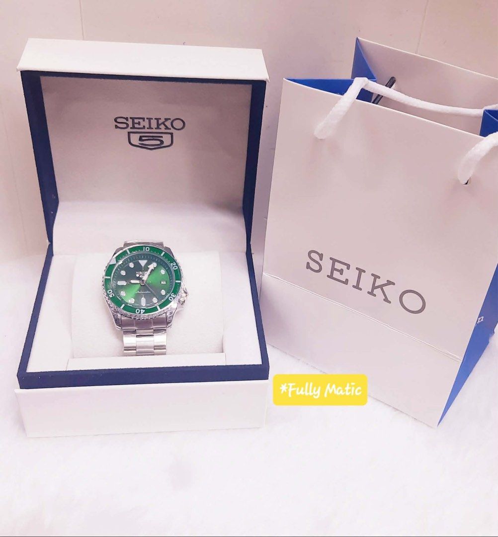 Seiko 5 Automatic Watch in Box with Bag (Category: Men's Watches) located in Las Pinas. Submitted by khallix596 (Listing ID 1467160317, Image 2). Description: - Automatic Seiko 5 movement with date display - Durable stainless steel construction - Available colors: Blue, Green, Black, and Red (GMT style) - Clean, classic design ideal for daily wear - Includes official display box and matching paper bag.