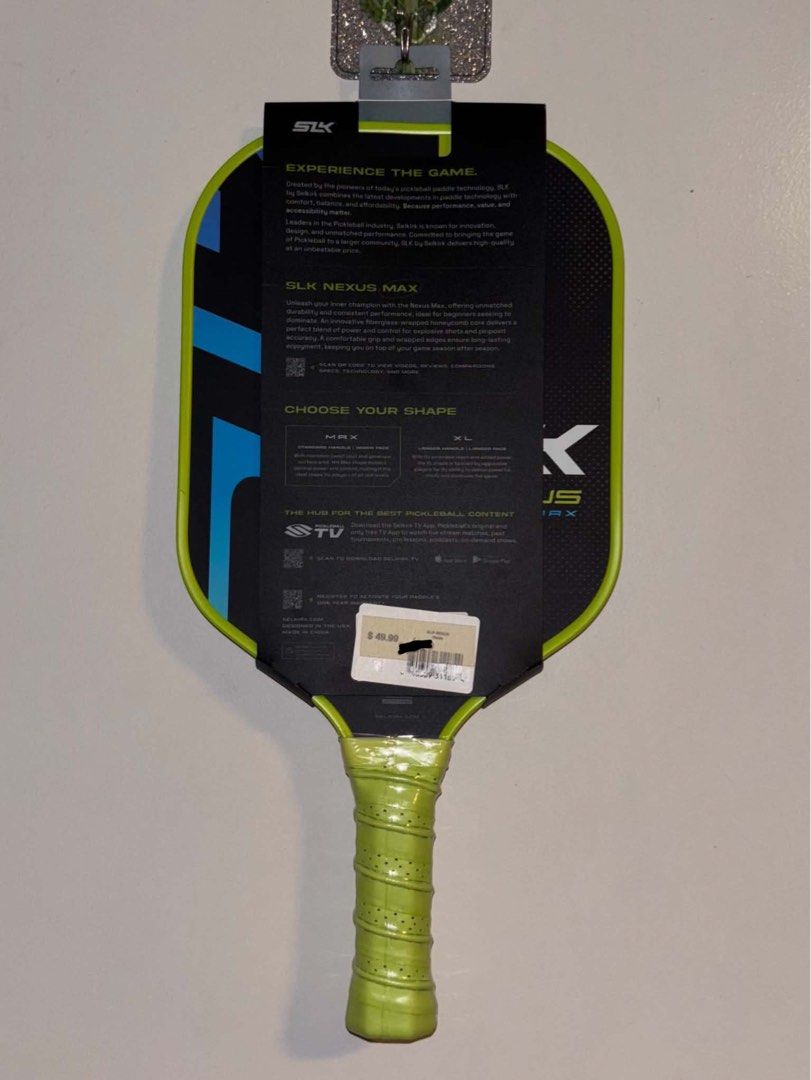 Selkirk Nexus Max Pickleball Paddle (Category: Racket and Ball Sports) located in Dasmarinas. Submitted by preloved.frommary (Listing ID 1467026814, Image 2). Description: - Bought from US - Brand: SLK Nexus Max by Selkirk - Condition: Brand new with original store packaging and price tag still attached - Design: Eye-catching neon green grip and edge guard with blue/black graphic face - Core/Face: Premium fiberglass-wrapped honeycomb core with Ma
