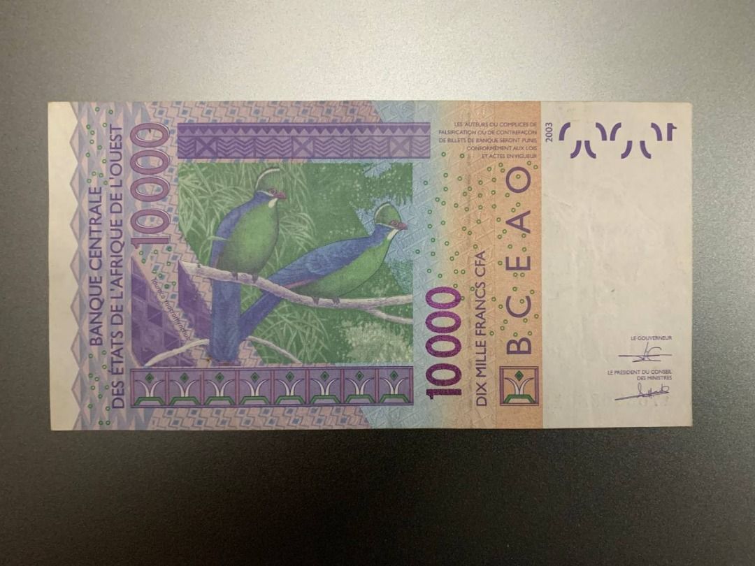 Senegal 10000 francs CFA banknote (Category: Currency) located in Indang. Submitted by vykolektor (Listing ID 1467094523, Image 2). Description: Senegal CFA 10000 francs Condition in photos.