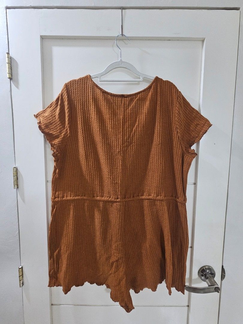 SHEIN Brown Waffle Knit Romper (Category: Shirts) located in Santo Tomas. Submitted by buybugs (Listing ID 1467114029, Image 3). Description: - Brand: SHEIN - Color: Brown - Condition: lightly used - Details: V-neckline, short sleeves, romper, trendy front tie detail, and textured waffle knit fabric - Perfect for casual everyday wear! MOP: GCash, Maya, Bank Transfer.