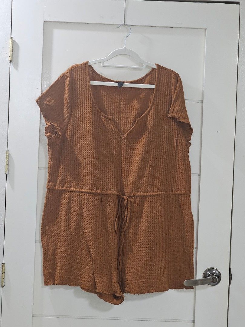 SHEIN Brown Waffle Knit Romper (Category: Shirts) located in Santo Tomas. Submitted by buybugs (Listing ID 1467114029, Image 2). Description: - Brand: SHEIN - Color: Brown - Condition: lightly used - Details: V-neckline, short sleeves, romper, trendy front tie detail, and textured waffle knit fabric - Perfect for casual everyday wear! MOP: GCash, Maya, Bank Transfer.
