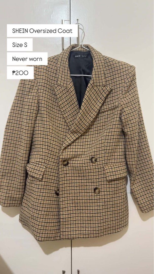 SHEIN Oversized Coat Size S (Category: Coats, Jackets and Outerwear) located in Marikina City. Submitted by vparcon (Listing ID 1467066622, Image 1). Description: - Brand: SHEIN - Style: Brown plaid oversized coat with lapel collar - Closure: Double-breasted front buttons - Details: Front flap pockets and black inner lining - Size: Small - Condition: Brand new with tags, never worn MARIKINA CITY.