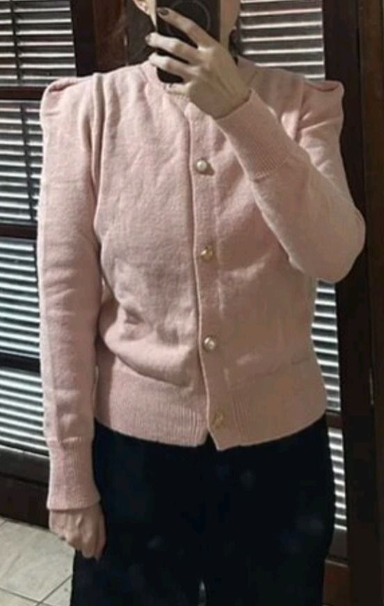 SHEIN Pink Puff Sleeve Cardigan (Category: Coats, Jackets and Outerwear) located in Makati City. Submitted by madame.kaye (Listing ID 1459930350, Image 3). Description: BUST 35.4 Length -27.1 Used once, it was too loose for me so this would be perfect for Medium size - Adorable pink cardigan - Features stylish puff sleeves - Unique gold button details - Comfortable ribbed cuffs and hem - Made from soft knit material - Versatile for layering or st