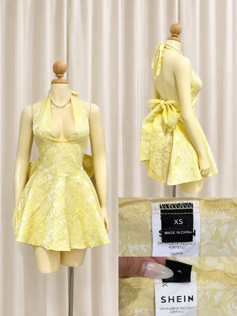 SHEIN Yellow Halter Dress (Category: Dresses) located in Bulacan. Submitted by nishiu (Listing ID 1467087183, Image 1). Description: - Brand: SHEIN - Size: XS on Tag but S- Large (Garter back) - Color/Pattern: Yellow floral jacquard - Style: Halter neck, deep plunge front, and flared skater skirt - Back Detail: Open back with a big statement tie-bow - Condition: Worn once.