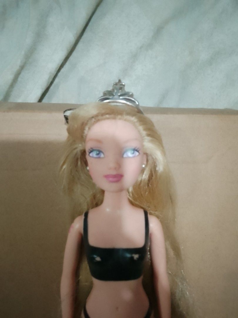 Shrek Princesses Rapunzel Doll (Category: Kids Toys) located in Davao. Submitted by sassykumi (Listing ID 1467032600, Image 1). Description: Includes her original earrings and crown with a princess dress. Only flaws are pink marks on her legs..