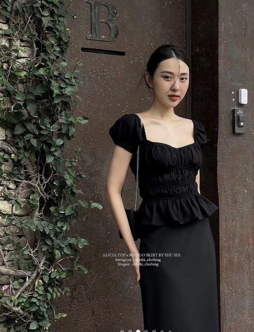 SHU SHI Black Ruffled Top (Category: Blouses) located in Cainta. Submitted by joycexo (Listing ID 1467039113, Image 3). Description: - Brand: SHU SHI - Style: Black Alicia top with square neckline, puff sleeves, and ruched bodice - Hem: Peplum hem at the waist - Size: Small (tag attached) - Condition: Never worn - RFS: Too big for me, this is size small - Bought for 1.1K .