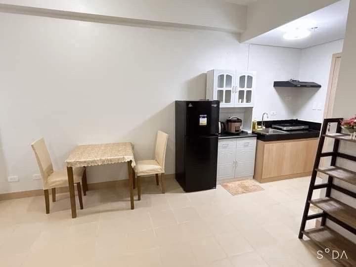SMDC Cheer Residences Marilao Condo Unit (Category: Apartments & Condos) located in Malabon City. Submitted by 1988lovero (Listing ID 1467045042, Image 3). Description: - Property: SMDC Cheer Residences, Marilao - Status: Ready for Occupancy (RFO) - Condition: Fully Furnished Interior - Inclusions: Dining table, chairs, refrigerator, kitchen counter setup, TV, shelves, and wardrobe cabinet - Amenities: Access to community swimming pool and outdoo