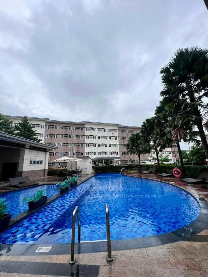 SMDC Cheer Residences Marilao Condo Unit (Category: Apartments & Condos) located in Malabon City. Submitted by 1988lovero (Listing ID 1467045042, Image 2). Description: - Property: SMDC Cheer Residences, Marilao - Status: Ready for Occupancy (RFO) - Condition: Fully Furnished Interior - Inclusions: Dining table, chairs, refrigerator, kitchen counter setup, TV, shelves, and wardrobe cabinet - Amenities: Access to community swimming pool and outdoo
