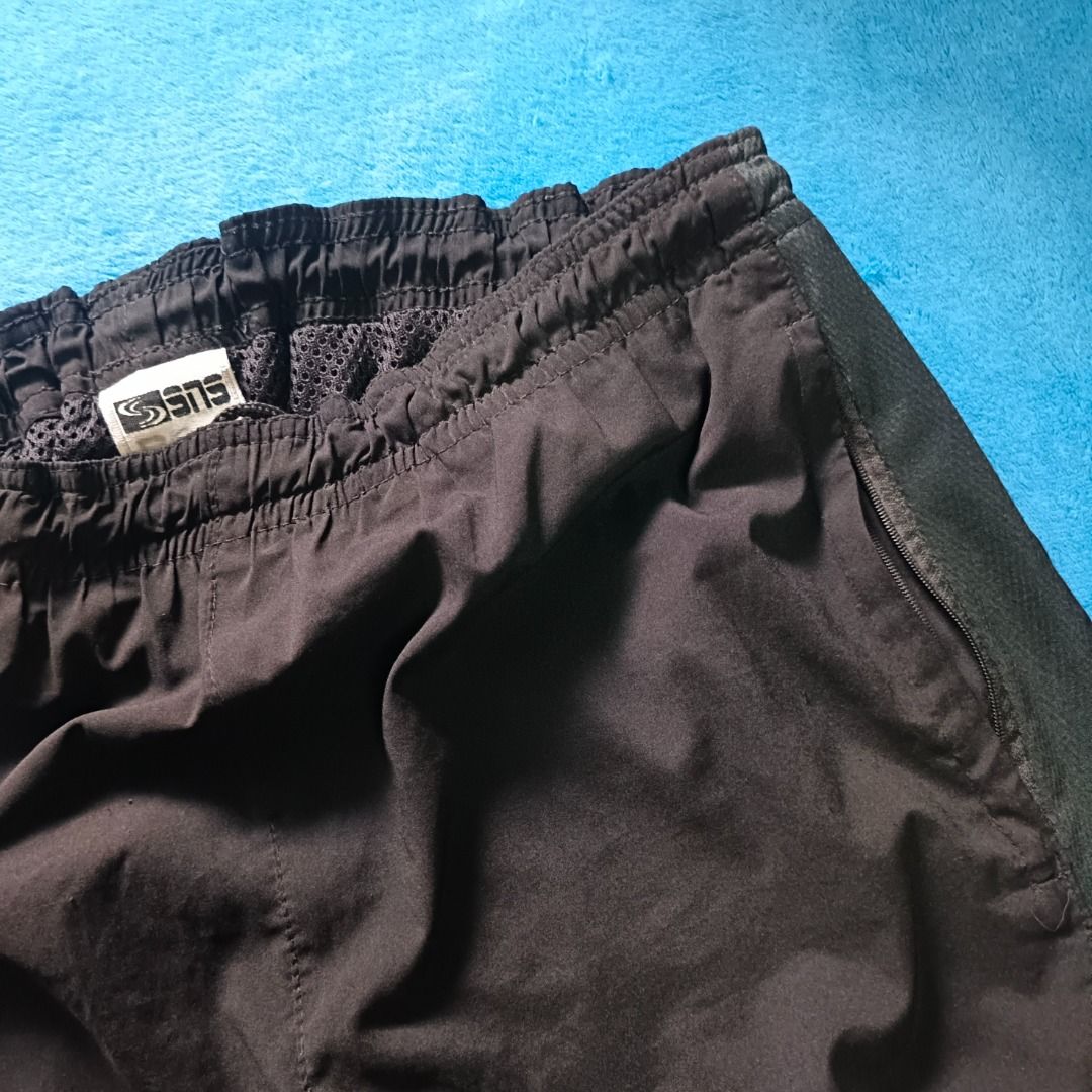 SNS Track Pants (Category: Joggers) located in Antipolo. Submitted by juliane_thrift-declutters (Listing ID 1467086632, Image 2). Description: SNS Track Pants Size: 38 inches (Adjustable) Length: 41 inches Thigh: 18 inches Leg Opening: 12 inches Zipper Hem Issue: None Tags: Complete Wash Tags Overall Condition: 9.7/10 * Color may vary due to lighting.