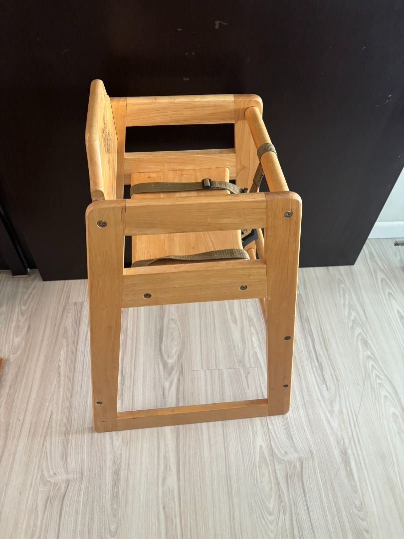 Solid Wood High (Category: Kids' Tables & Chairs) located in Subang Jaya. Submitted by justusername1234567 (Listing ID 1467013618, Image 2). Description: Preloved solid wood kids’ high chair with safety straps. Sturdy design, natural wood finish, and easy to clean. Suitable for toddlers, with secure buckles to keep your child safe during mealtime. Height arond 70 cm.