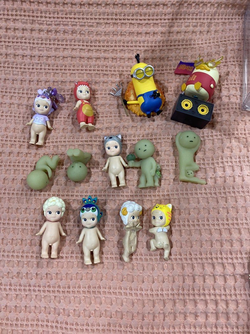 SONNY ANGELS, SMISKIS, POPMART (Category: Designer & Blind Box Toys) located in Manila. Submitted by ysabaw (Listing ID 1466981639, Image 1). Description: PRICED AT EACH sonny hippers - 180 smiskis - 255 popcorn, blue peacock - 230 grey cat - 300 purple peacock & red dino - 350 (SOLD) minion - 245 duck - 340 .