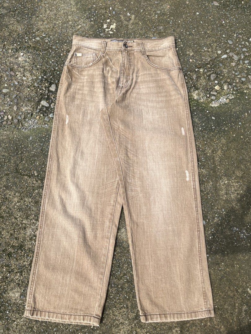 SOUTHPOLE (Category: Jeans) located in Gapan. Submitted by jamminandcrackin (Listing ID 1467052497, Image 3). Description: - Brand: Southpole - Style: 90s skater baggy denim jeans with wide legs - Color/Wash: Textured brown wash - Size: Tagged size 32 waist - Details: Branded hardware on back pockets and Southpole patch logo near waistband - Origin: Made in Pakistan - Condition: Great vintage streetwear piece, easy to style with oversized tees an