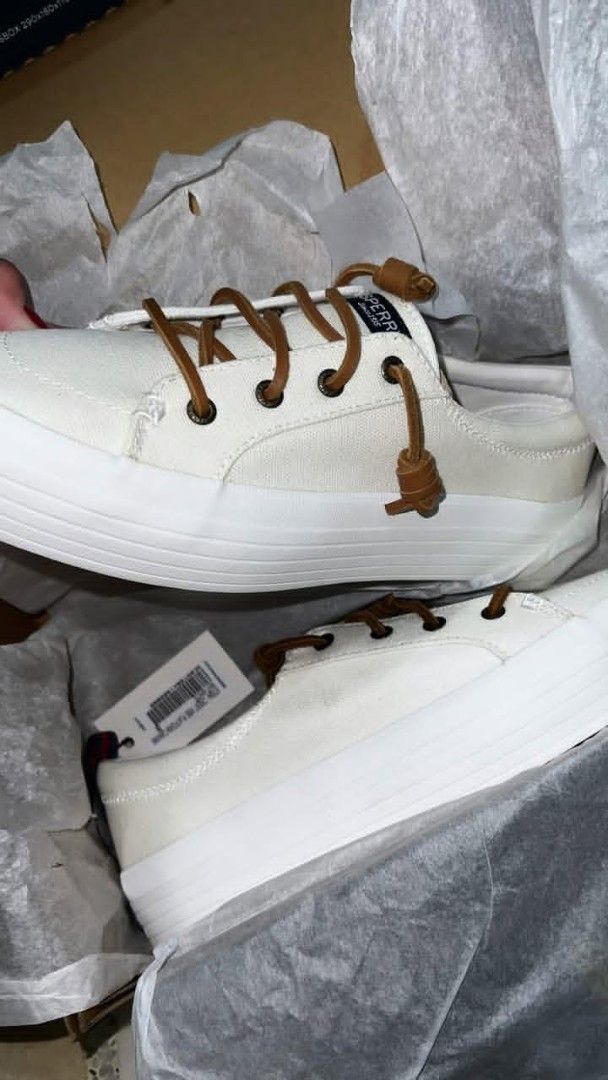 Sperry White Canvas Platform Sneakers (Category: Sneakers) located in Manila. Submitted by summerstyled (Listing ID 1467041216, Image 1). Description: - Brand: Sperry - Color: Clean All-White - Style: Platform sneakers with chunky sole and brown leather knotted laces - Condition: Brand new with store tag attached - Packaging: Complete with original shoebox and tissue paper.