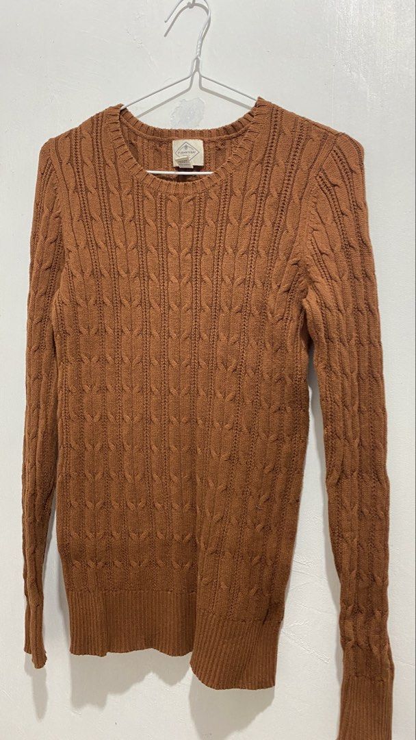 St John's Bay Brown Cable Knit Sweater Size S (Category: Coats, Jackets and Outerwear) located in Ozamiz City. Submitted by carisclosetcleanup (Listing ID 1467122685, Image 2). Description: - Brand: St John's Bay - Size: Small - Color: Brown - Material: Warm textured cotton blend - Design: Classic crew neck with ribbed cuffs and hem - Condition: Great essential piece for cooler weather.