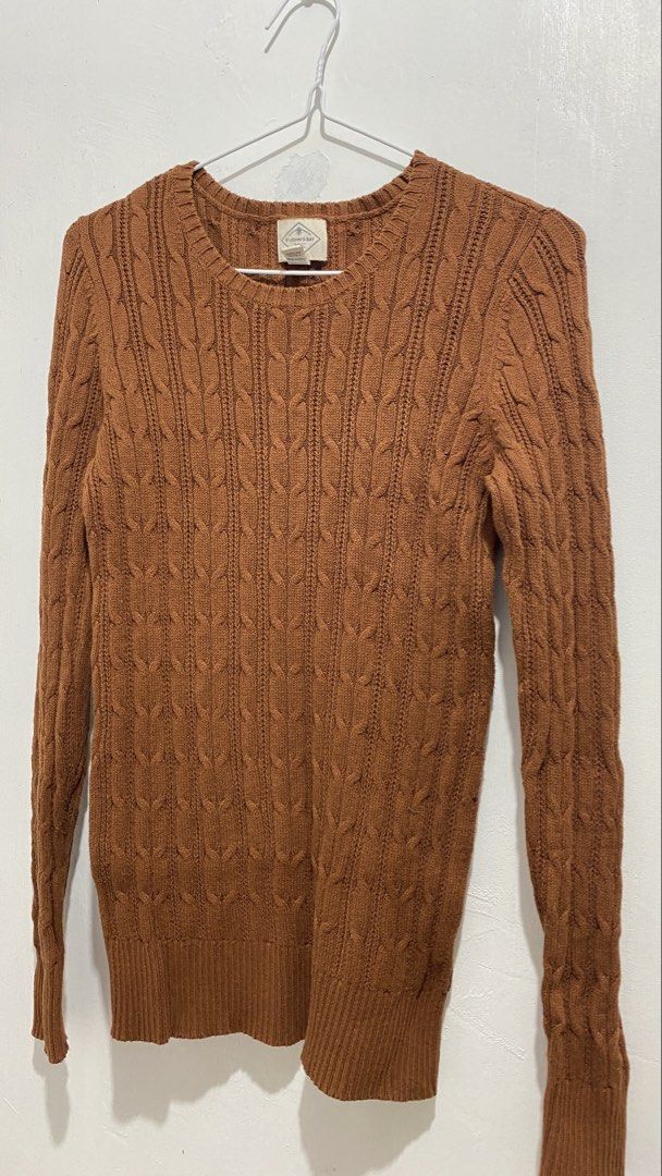 St John's Bay Brown Cable Knit Sweater Size S (Category: Coats, Jackets and Outerwear) located in Ozamiz City. Submitted by carisclosetcleanup (Listing ID 1467122685, Image 3). Description: - Brand: St John's Bay - Size: Small - Color: Brown - Material: Warm textured cotton blend - Design: Classic crew neck with ribbed cuffs and hem - Condition: Great essential piece for cooler weather.