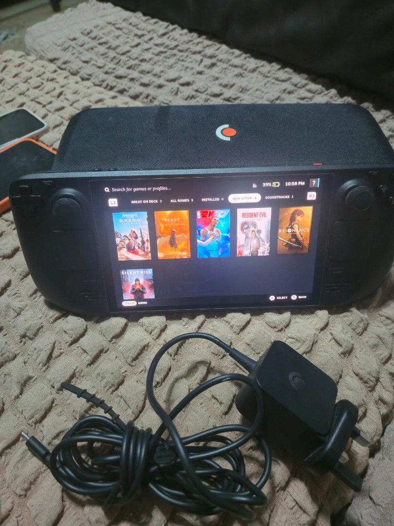 Steam Deck oled 512gb With games (Category: PlayStation) located in San Juan City. Submitted by lukapukus (Listing ID 1467131159, Image 1). Description: For sale only pass po sa swap Price 32k Steam deck oled 512gb tangal lang rubber left analog not afecting performance (free analog cap) Tempered glass install day one BATTERY HEALTH 96% Unit Charger Pouch Dock Analog cap Nonsteam games install Nba 2k27 Assassins creed blackflag resynced Silent hi