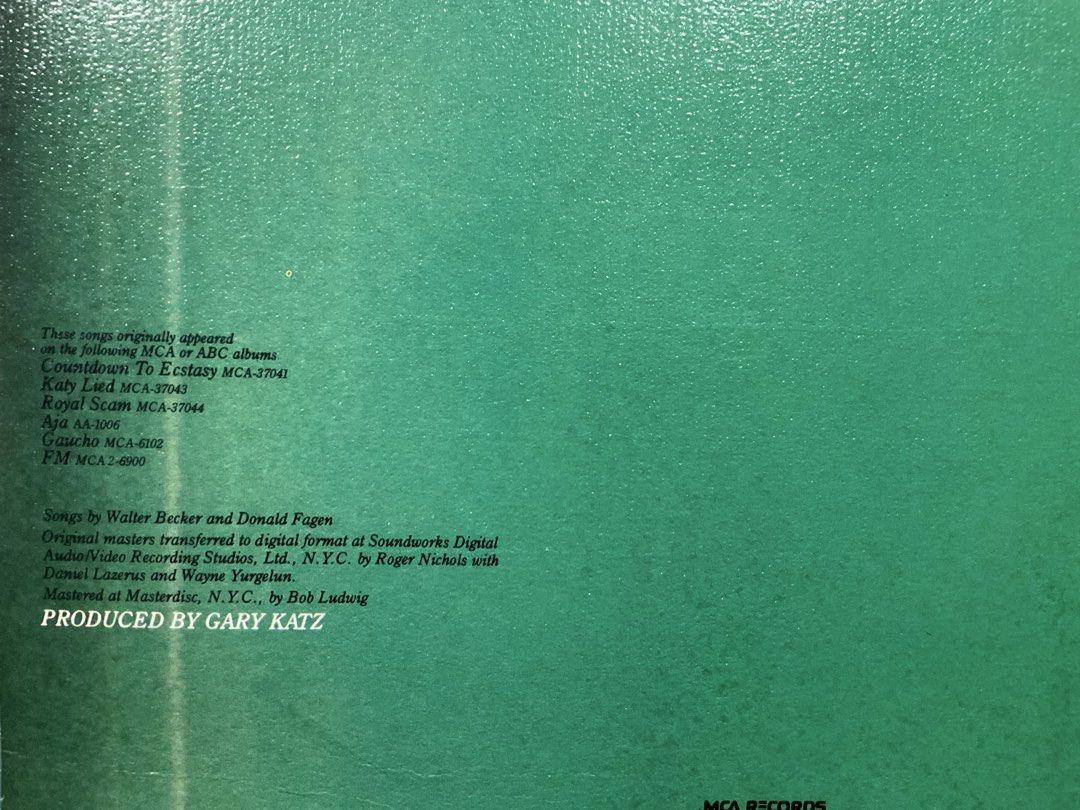 Steely Dan - Gold Vinyl Record (Category: Vinyls) located in Manila. Submitted by isko_sarisari (Listing ID 1421360868, Image 3). Description: - Steely Dan "Gold" vinyl record - Original album packaging - Features the colorful abstract album art - MCA-1403 catalog number.