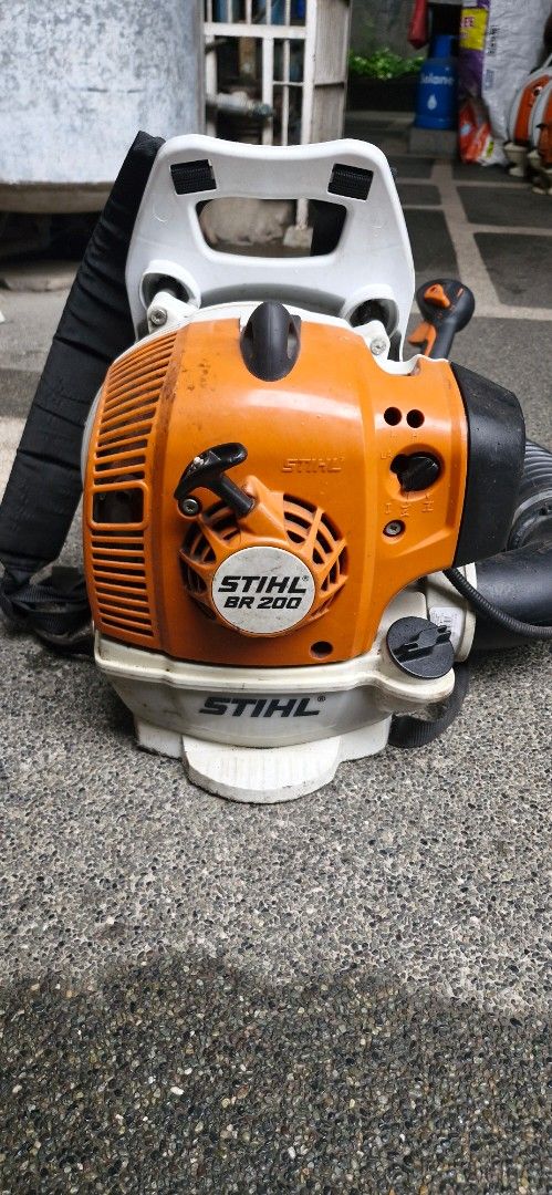 STIHL BR 200 Backpack Leaf Blower (Category: Grass Mowers & Trimmers) located in Marikina City. Submitted by boysel (Listing ID 1467167829, Image 1). Description: - Brand/Model: STIHL BR 200 backpack leaf blower - Engine: Powerful and efficient 2-MIX engine - Comfort: Lightweight design with an anti-vibration system and padded back support - Condition: Clean orange and white housing - Inclusions: Full blower tube setup and adjustable harness stra
