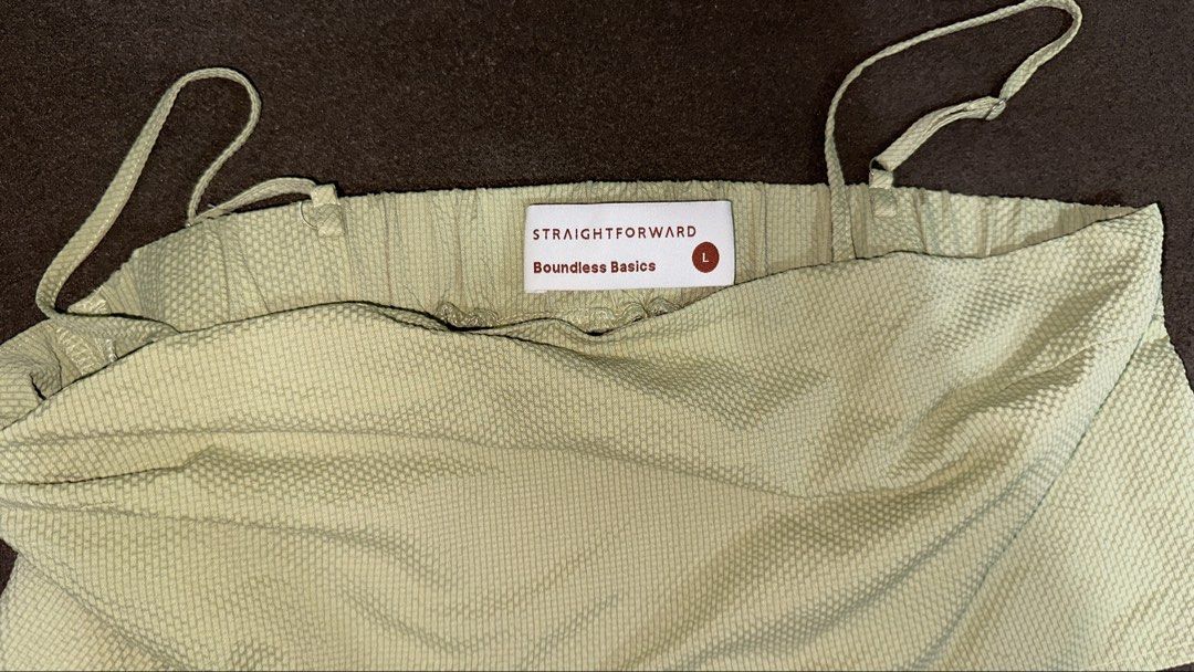 Straightforward Boundless Basics Crop Top (Category: Shirts) located in Manila. Submitted by klmesco (Listing ID 1467058803, Image 3). Description: - Straightforward Crop Top - Color: Pastel Olive - Size: L - Textured seersucker fabric - Adjustable spaghetti straps, square neckline, smocked back panel for stretch, and side hem slits - RFS: Decluttering, need funds 🥹.