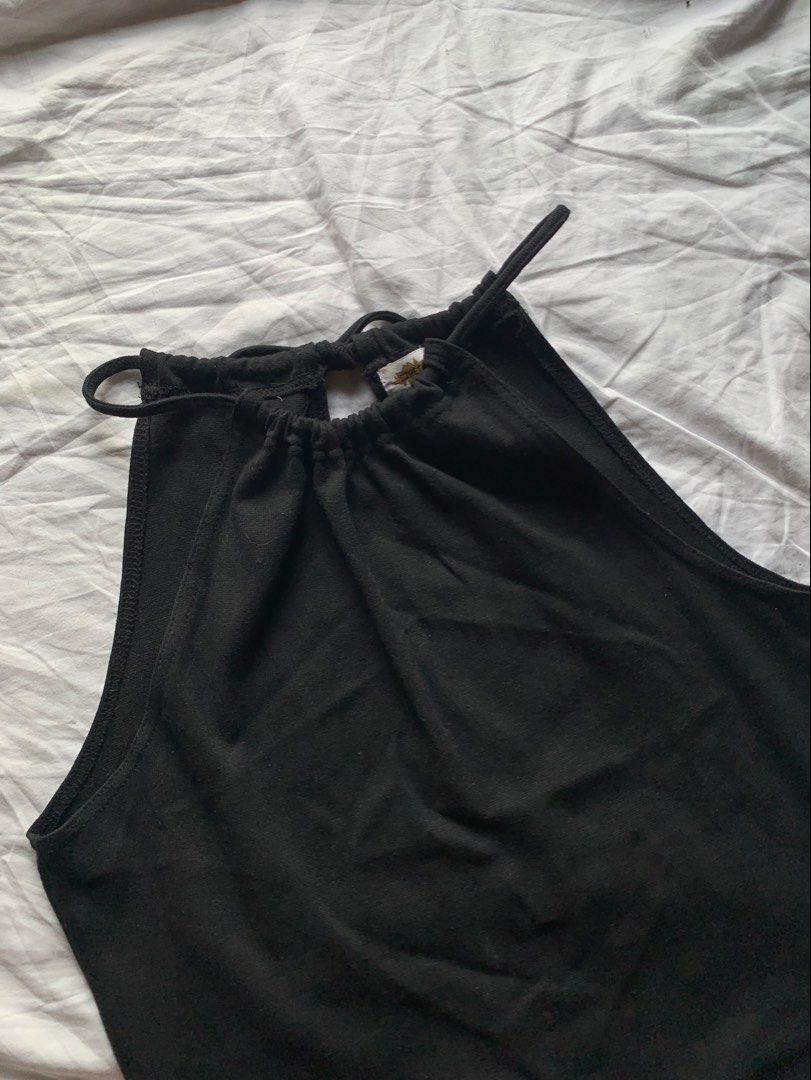 Stretch Sleeveless Tie Top (Category: Sleeveless) located in Taguig. Submitted by prelovedbynette (Listing ID 1466998847, Image 3). Description: Size M A bit stretchable No when worn Can be worn multiple ways (front and back) .