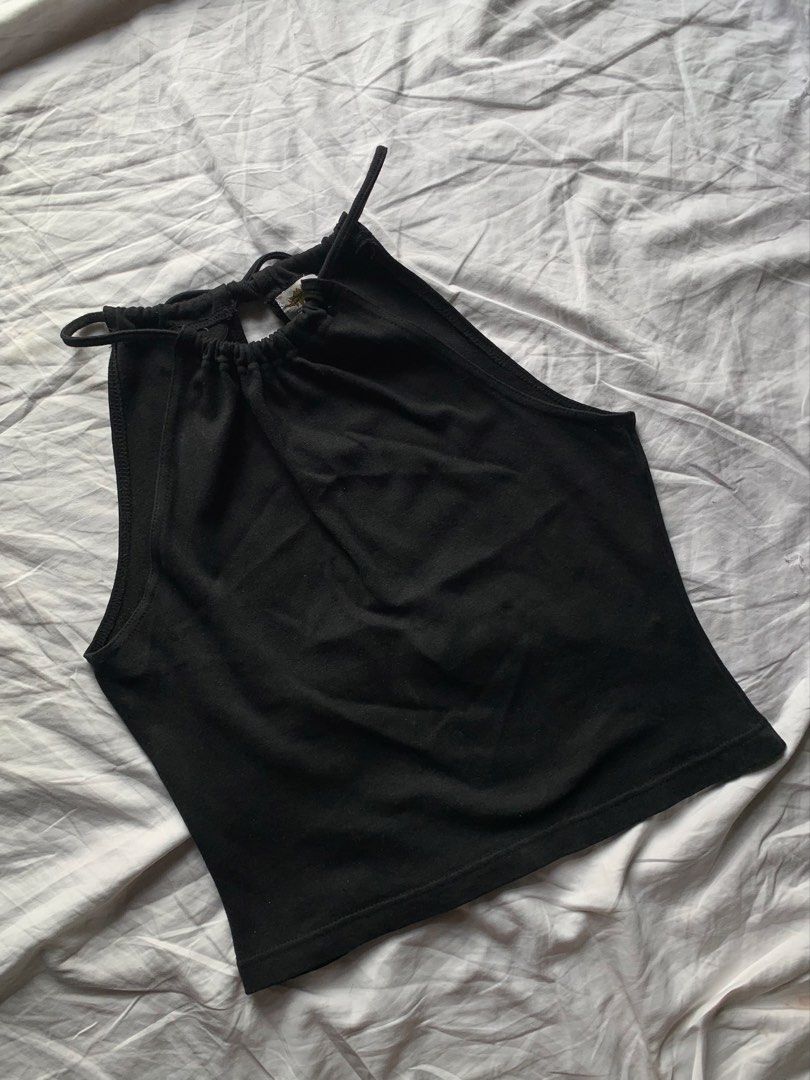 Stretch Sleeveless Tie Top (Category: Sleeveless) located in Taguig. Submitted by prelovedbynette (Listing ID 1466998847, Image 1). Description: Size M A bit stretchable No when worn Can be worn multiple ways (front and back) .