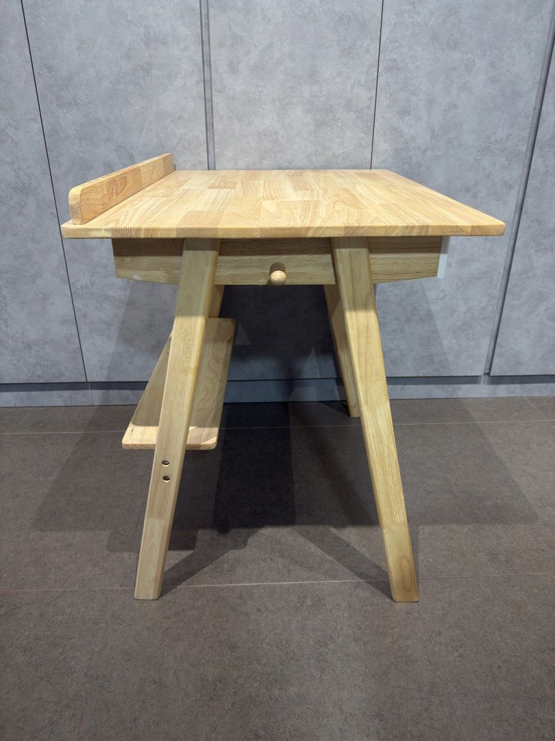 Study work table (Category: Tables & Sets) located in Singapore. Submitted by bri_pey (Listing ID 1467068653, Image 3). Description: -Like new wooden study desk. Can be used as work or vanity table too - Comes with a pull out drawer -Measurement: Length 80cm x Width 60cm x Height 74cm Letting got at $65. Self collection at redhill area..
