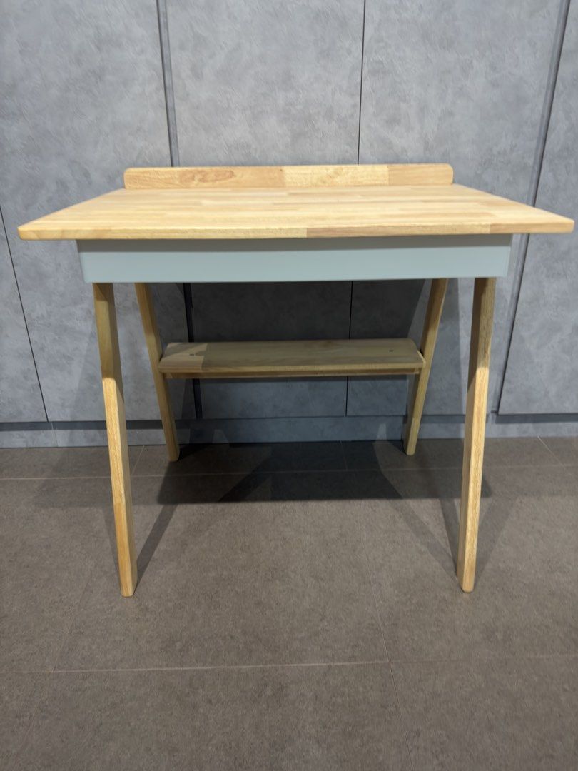 Study work table (Category: Tables & Sets) located in Singapore. Submitted by bri_pey (Listing ID 1467068653, Image 2). Description: -Like new wooden study desk. Can be used as work or vanity table too - Comes with a pull out drawer -Measurement: Length 80cm x Width 60cm x Height 74cm Letting got at $65. Self collection at redhill area..