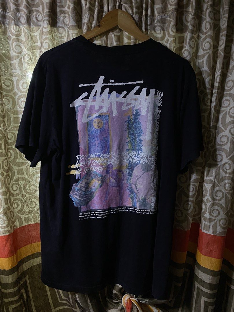Stussy Black Graphic T-Shirt Medium (Category: Tshirts & Polo Shirts ) located in Manila. Submitted by kentmarion.water (Listing ID 1467128591, Image 2). Description: - Brand: Stussy - Color: Black - Size: Medium (Made in Mexico) - Design: Small front chest logo, large graphic art and text print on the back - Condition: Clean overall with zero cracking on graphics - Style: Classic streetwear staple.