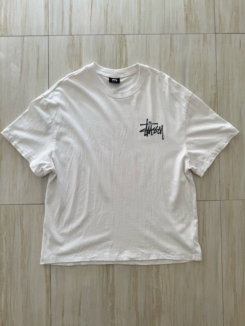 Stussy White T-Shirt (Category: Tshirts & Polo Shirts ) located in Mandaluyong City. Submitted by rxstudio (Listing ID 1467060516, Image 3). Description: Stussy White Basic Tee Size: Large Measurements: Length 27 inches | Width 21 inches ₱800 + SF Pick-up/Meet-up: Mandaluyong, Highway Hills (recommended to avoid scams) Delivery: Available via Lalamove (Shipping fee to be shouldered by the buyer).