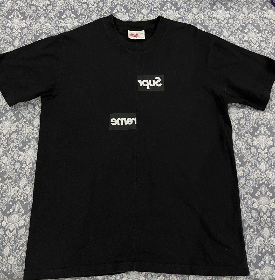 Supreme x Comme des Garcons SHIRT Split Box Logo Tee (Category: Tshirts & Polo Shirts ) located in Batangas. Submitted by gavsandrix (Listing ID 1467097243, Image 1). Description: - Brand: Supreme x Comme des Garçons SHIRT - Item: Split Box Logo Short Sleeve T-Shirt - Color: Black - Size: Medium - Details: Standard crew neckline, 100% cotton fabric - Condition/Tags: Includes collar tag and Portugal manufacturing tag - Mode of transaction: Shippin