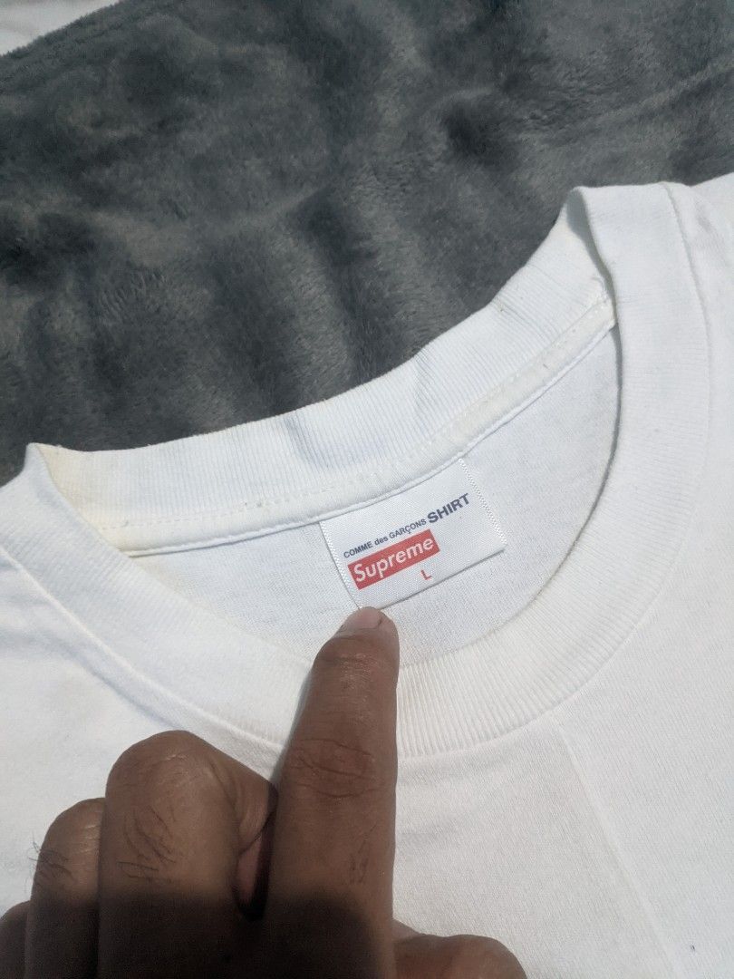 Supreme x Comme des Garcons Split Box Logo Tee (Category: Tshirts & Polo Shirts ) located in San Ildefonso. Submitted by tripniberto (Listing ID 1467143232, Image 2). Description: Supreme x CDG Dimes: 22.5/31 Issue: Need wash, Washable Stains(or not), Hairlines Color Rate: 9/10(or better) (lighting may affect the color on images) MOP: gcash MOD: j&t(+sf) NO RUSH SHIPPING!!! (3-5days Ship out!) please manage your expectations this is ukay items PM