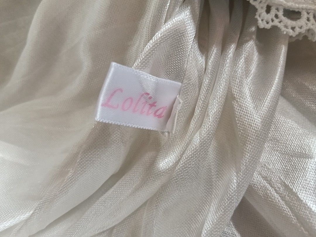 Sweet Lolita Jumper (Category: Others Tops) located in Cavite. Submitted by angelic.clot (Listing ID 1467022597, Image 3). Description: - Brand: TaTaTa Lolita (Legit Taobao Lolita brand) - Color: Off-white / Baby Blue cow print + Baby pink accents - Style: Babydoll / JSK, sleeveless with adjustable heart button straps - Features: - Embroidered pink heart with blue bow sa chest - White lace frill + star bows - Detachable fluffy bunny pocket with e