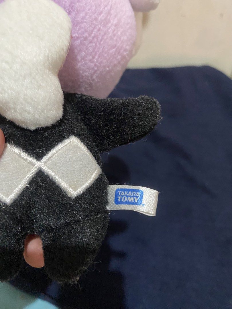 Takara Tomy Pokémon Gothita Plush (Category: Plushies & Soft Toys) located in Manila. Submitted by resi.diaz (Listing ID 1467000002, Image 3). Description: - Official Takara Tomy Pokémon Gothita plush toy - Features a purple head, black body with a diamond pattern on the back, and white collar and ear tufts - Authentic tag attached at the back - Condition: Minor lint collection from display, otherwise well-kept - Perfect addition for Pokémon plus